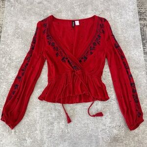Divided Red Embroidered Peplum Blouse